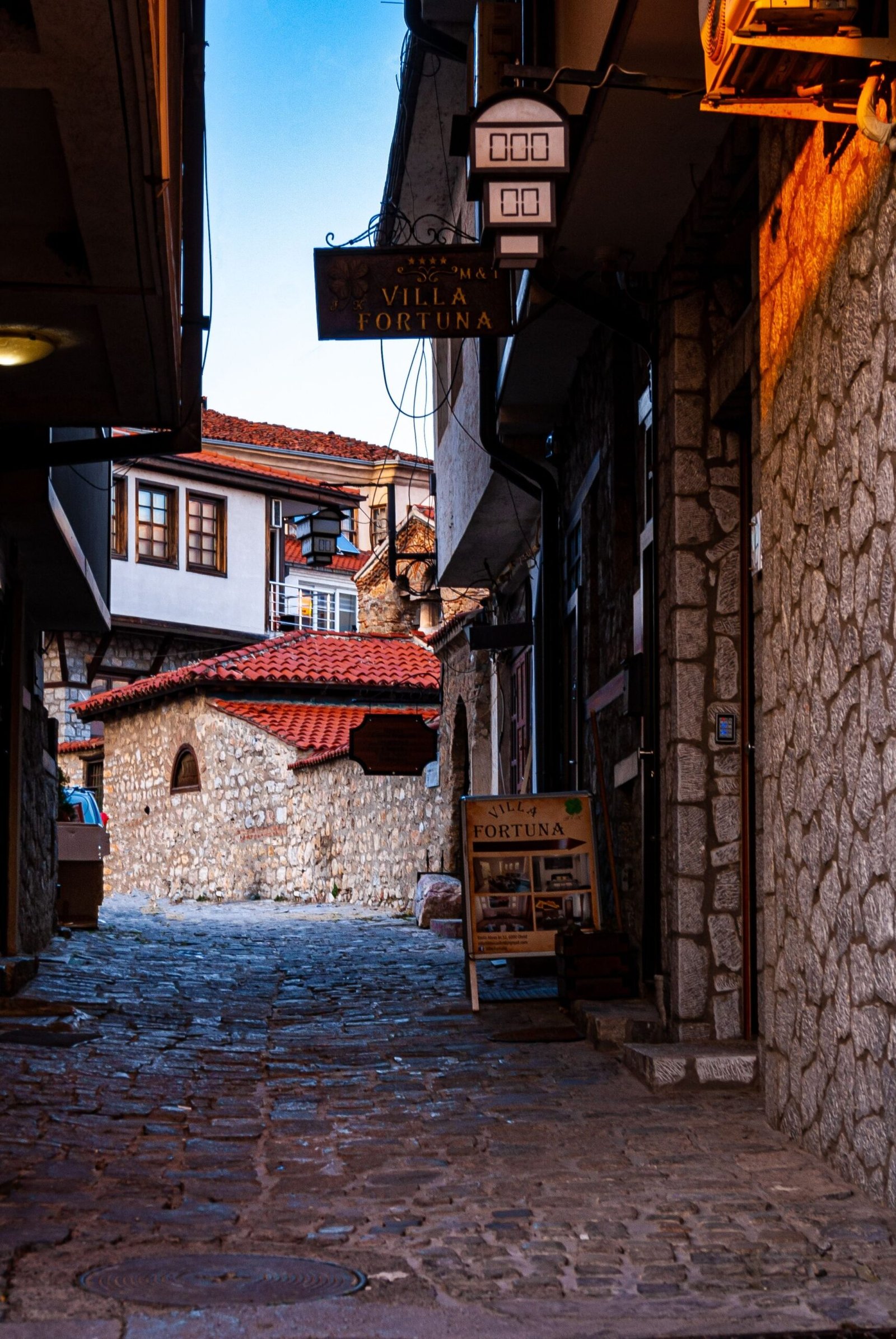 Ohrid Old Bazaar street with traditional stone houses and craft shops